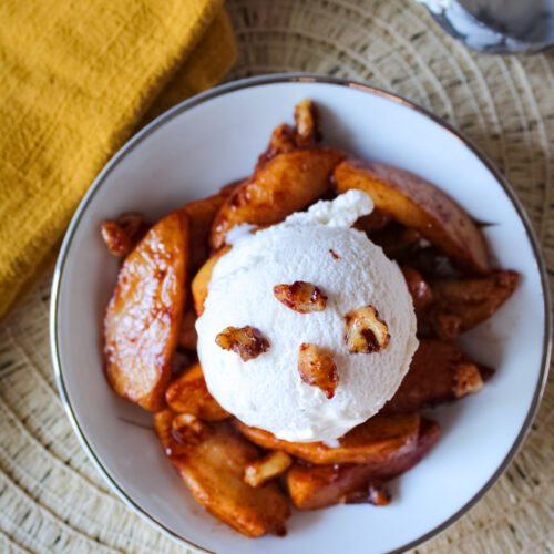 Warm cinnamon apples with walnuts and vanilla icecream